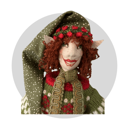 Pierrenoel: Art Doll by Mary Cantore features curly red hair, pointy elf ears, a green and white polka-dot hat, and a knitted green sweater with red and white accents—a charming Christmas Elf for your collection.